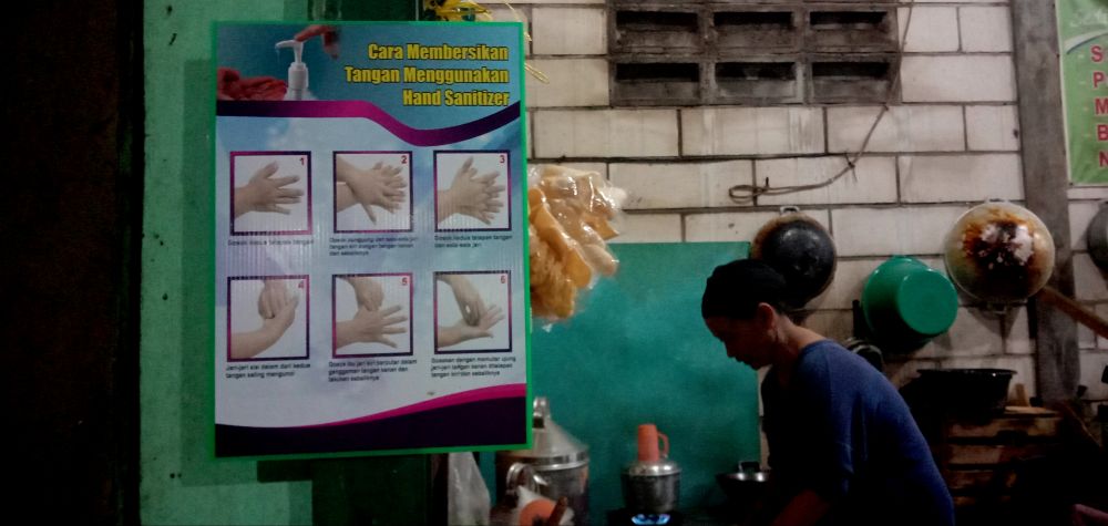 Poster imbauan PIOS bagi pedagang untuk mencuci tangan guna mencegah penyebaran Virus Corona