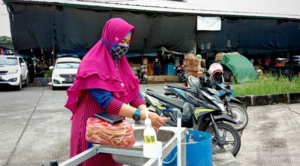 PIOS terus melakukan kampanye sebagai pasar sehat untuk mencegah penyebaran Virus Corona (Foto-foto: Sahlul Fahmi/jatimnow.com)