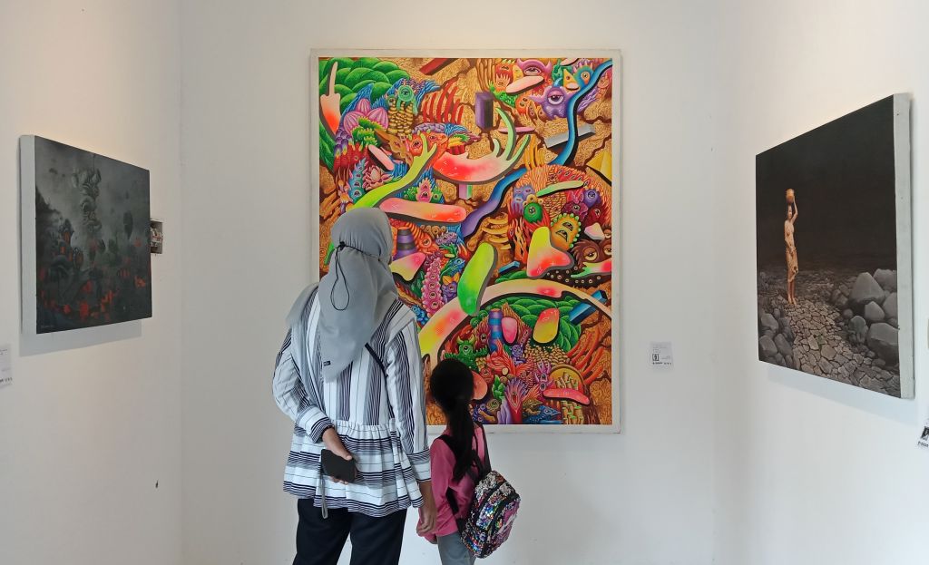 Pameran GresArt #6 di Senja Jingga Kafe & Art Space, Putri Cempo, Kebomas, Gresik. (Foto: Sahlul Fahmi/jatimnow.com)