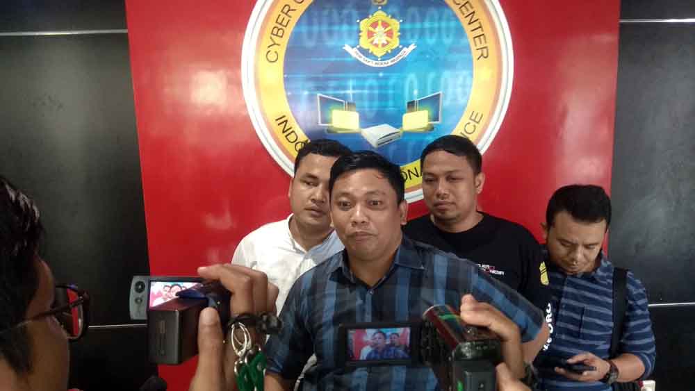 Kasubdit V cyber crime Ditreskrimsus Polda Jatim AKBP Harisandi