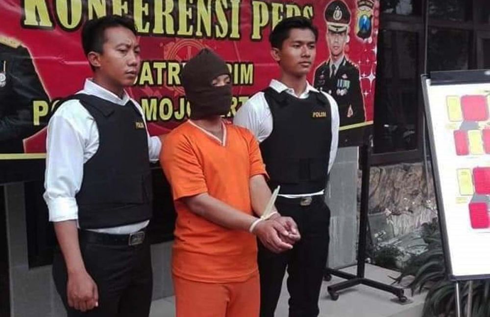 Aris, sang predator anak saat diamankan polisi Oktober 2018