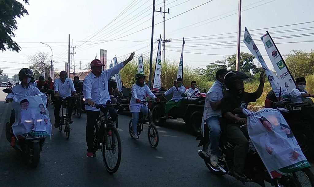 Pilkada Mojokerto 2020, Pungkasiadi-Titik Daftar ke KPU Sambil Gowes