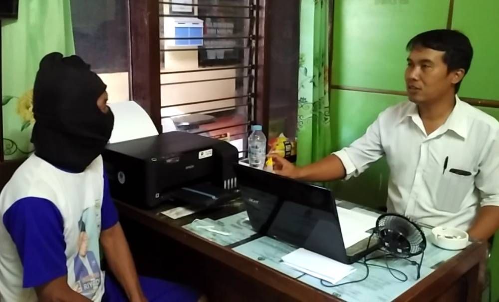 Kakek JT dihadapan penyidik Polres Pasuruan Kota