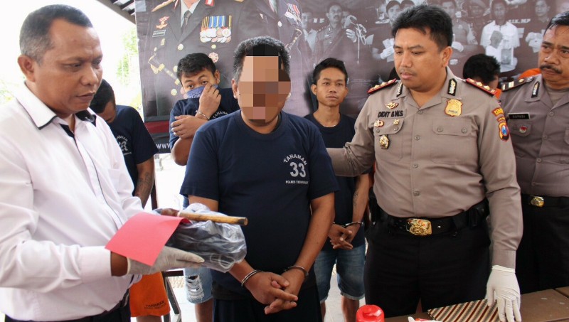 Kapolres Trenggalek saat jumpa pers kasus penganiayaan, Jumat (14/9/2018).