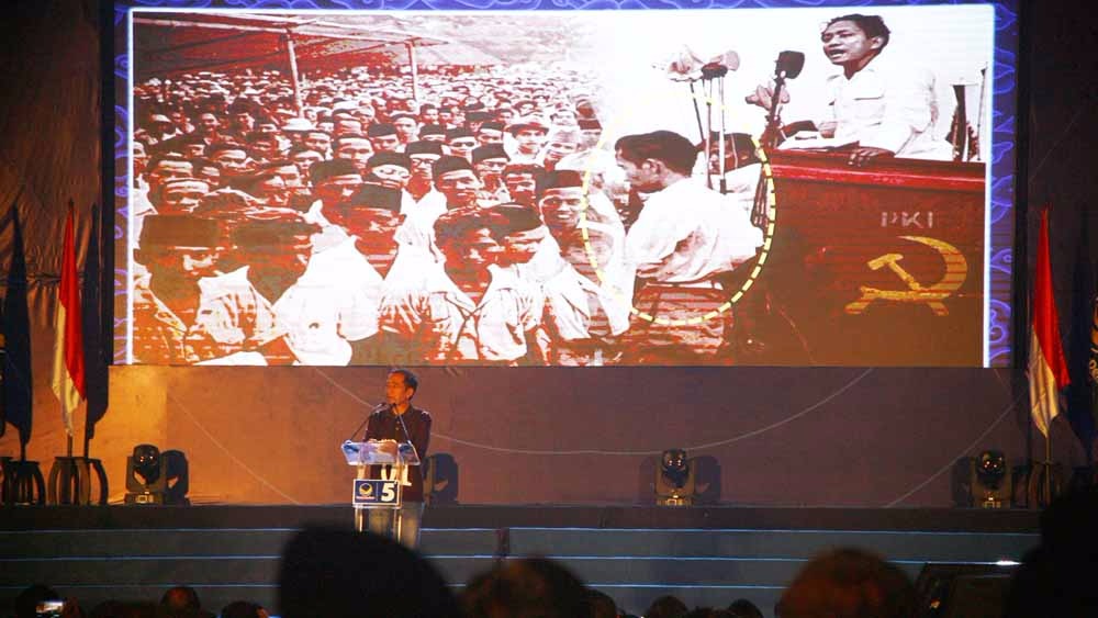 Jokowi saat sambutan dalam Apel Siaga Pemenangan Partai NasDem Jawa Timur di gedung JX International, Jalan A Yani, Surabaya, Minggu (28/10/2018).