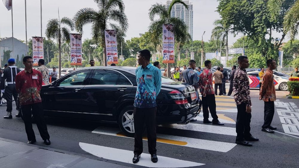 Suasana penjagaan mobil Presiden Jokowi