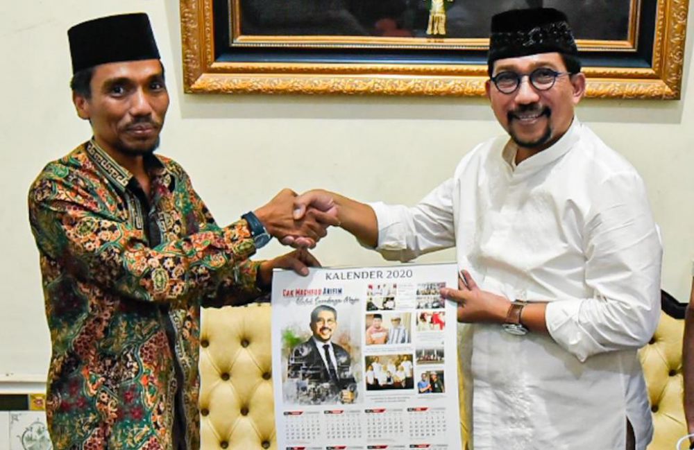 Machfud Arifin bersama Ketua PCNU Surabaya Muhibbin Zuhri