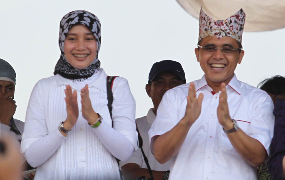 Bupati Anas dan istri/Foto: Budi Sugiharto
