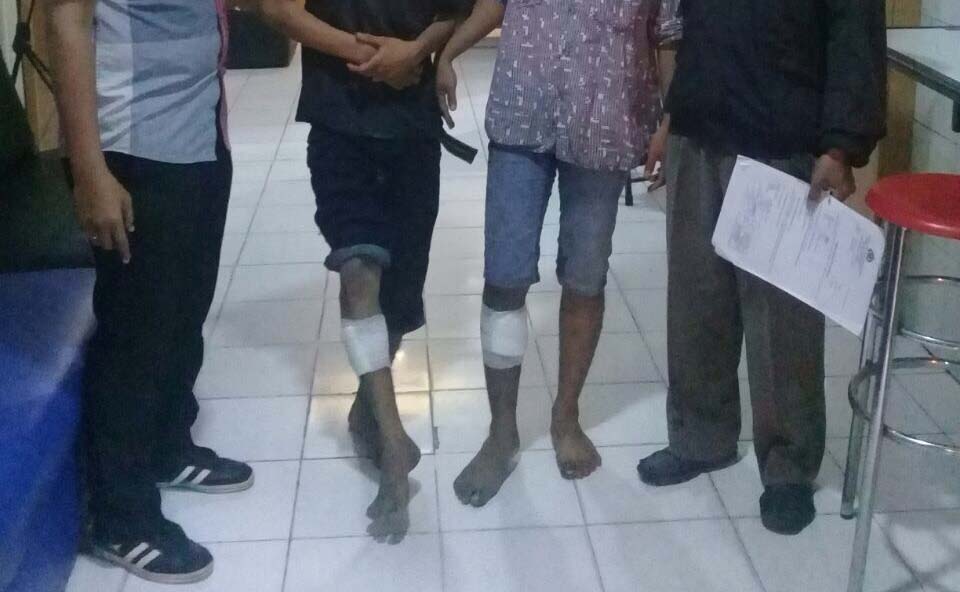 Pelaku Lukman dan Rizal saat diamankan di Mapolsek Tambaksari Surabaya. 