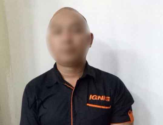 Pelaku Nur Kholis saat Mapolrestabes Surabaya.