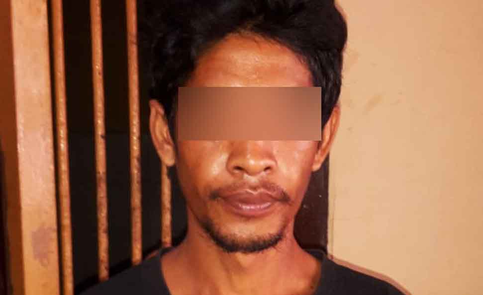 Tersangka saat berada di Mapolres Blitar