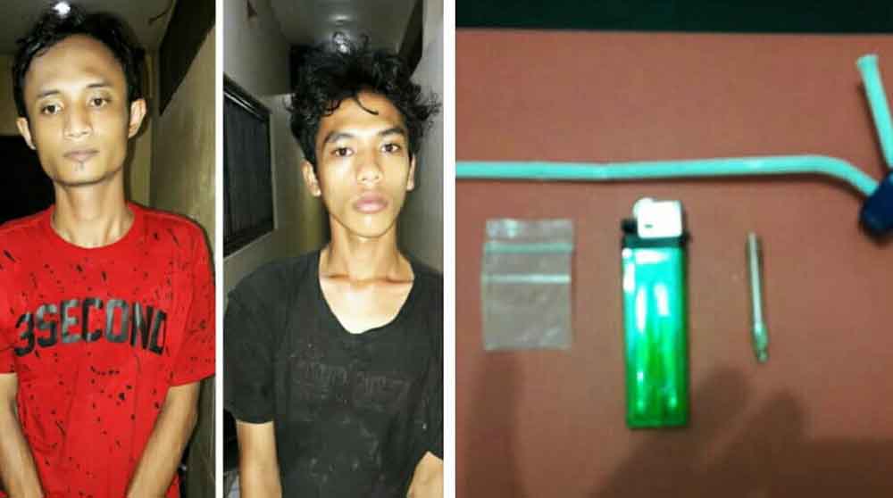 Dua tersangka beserta barang bukti alat hisap sabu