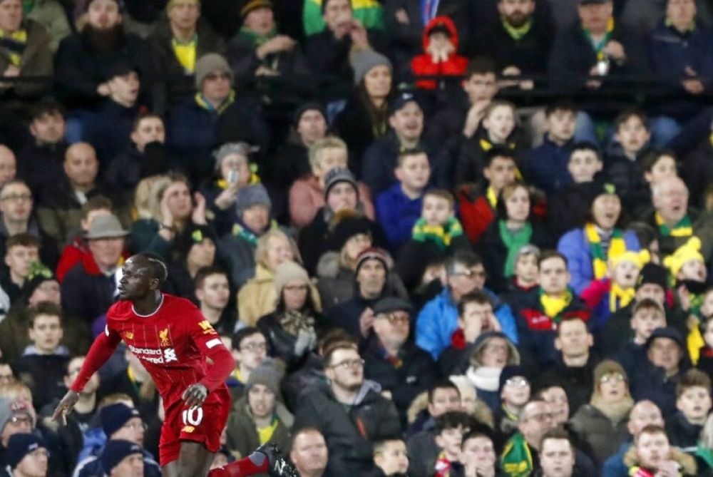 Penyerang Liverpool Sadio Mane mencetak gol untuk The Reds pada laga melawan Norwich City (Foto: AP Photo/Frank Augstein)