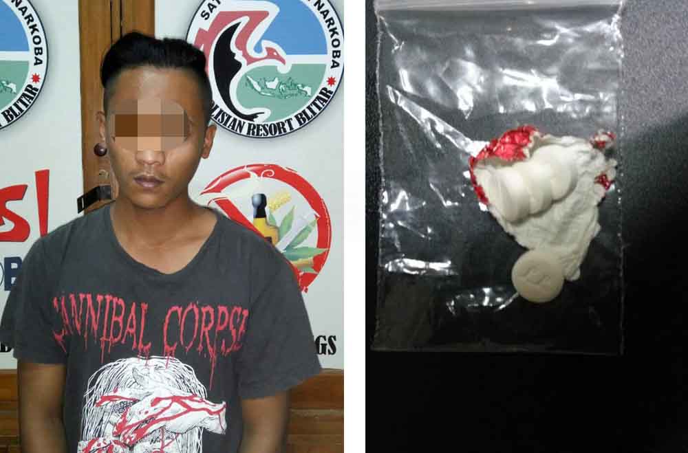 Tersangka Jaidong bersama barang bukti pil koplo