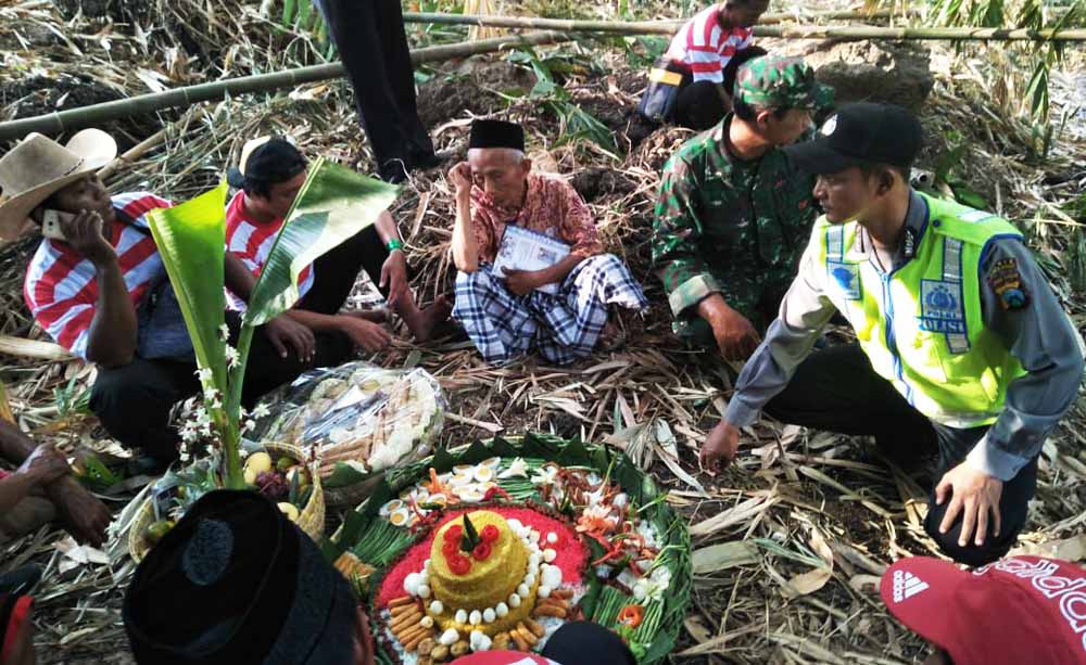 Proses ritual doa di tempat yang disakralkan