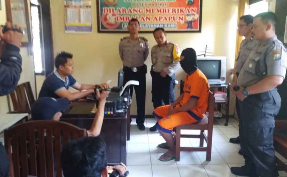 Tersangka saat di Mapolres Magetan