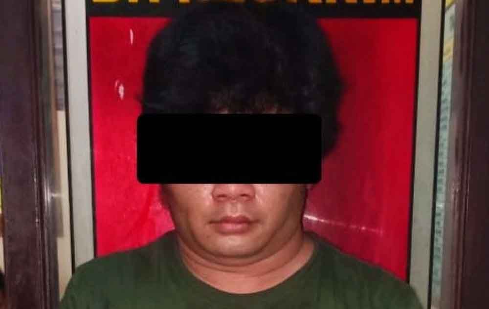Tersangka saat di Mapolres Mojokerto Kota