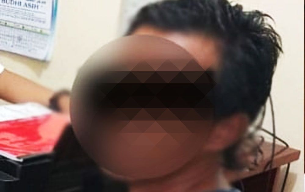 Salah satu tersangka saat diamankan di Mapolsek Turen