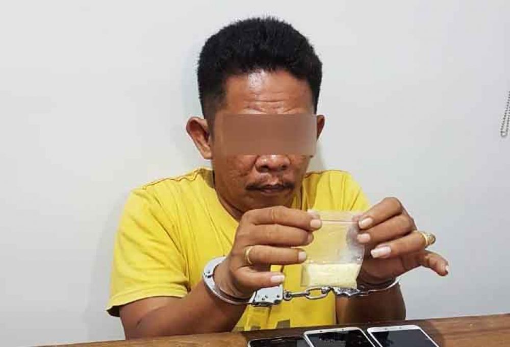 Tersangka saat di Mapolda Jatim