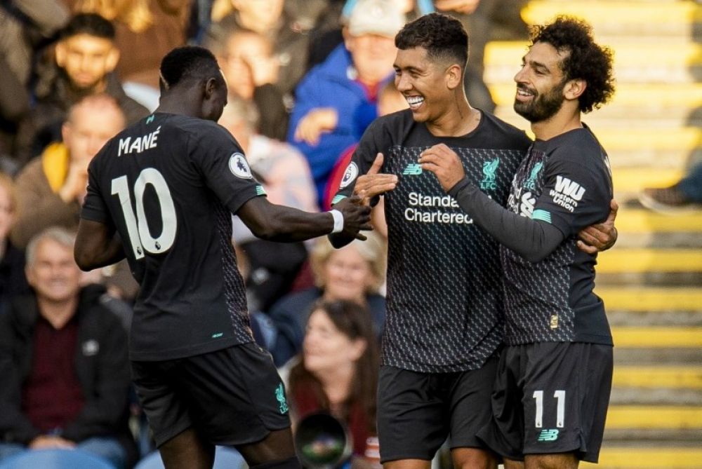 Sadio Mane, Roberto Firmino dan Mohamed Salah (Foto: EPA/Peter Powell)


