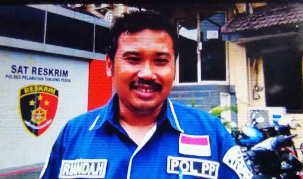 Anggota Satpol PP saat melapor ke Polres Pelabuhan Tanjung Perak