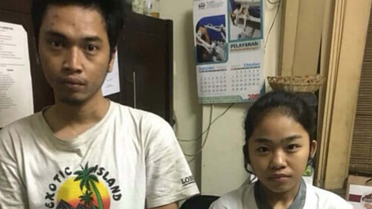 Sepasang kekasih saat diamankan di Mapolres Pelabuhan Tanjung Perak Surabaya. 