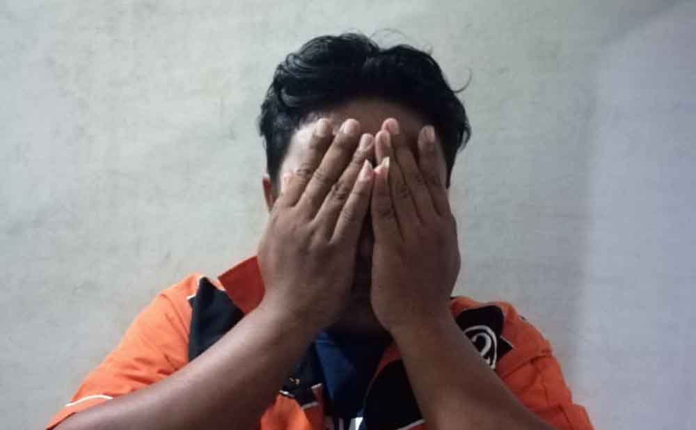 Tersangka saat berada di Mapolres Pelabuhan Tanjung Perak