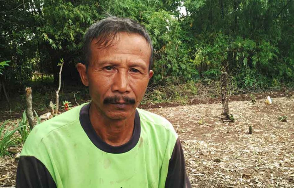 Tuman, 61, warga Dusun Doyong Selatan, Desa Kenduruan, Kecamatan Sukorejo, Kabupaten Pasuruan.